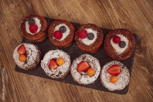 gluten-free cakes decorated with berries. healthy food concept.