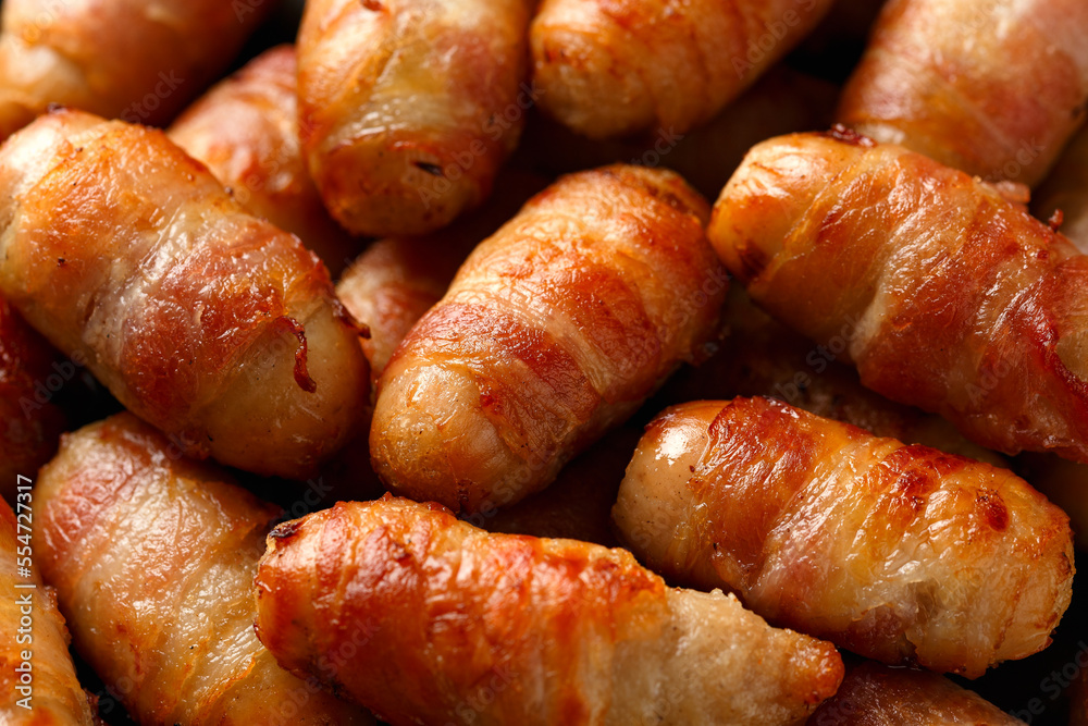 Pigs in blankets with ketchup and mustard sauce. Party food Pigs in blankets with ketchup and mustard sauce. Party food