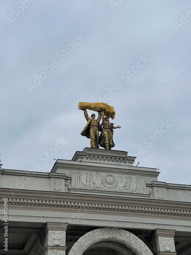 soviet statues on top of the building