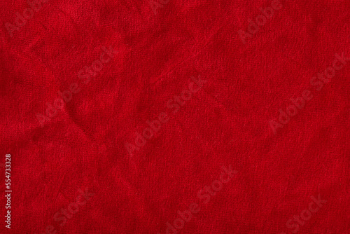 Red velvet texture for postcard or background for design. Red background for Christmas theme or Valentine's day, high quality, large format.