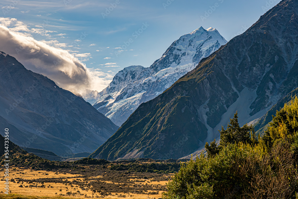 The clouds rolling over the the hills to the left of Mt Cook at Aoraki Mt Cook National Park