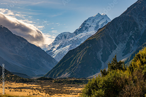 Fototapeta Naklejka Na Ścianę i Meble -  The clouds rolling over the the hills to the left of Mt Cook at Aoraki Mt Cook National Park