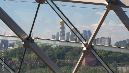 View of the Ivan the Great bell tower and the Kremlin from under the dome of the Zaryadye Park media center in the center of Moscow.