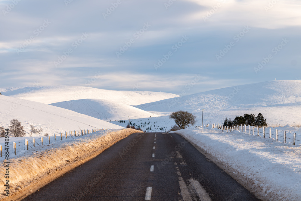 17 December 2022. Tomintoul,Moray,Scotland. This is Cock Bridge to Tomintoul Road following heavy snowfall storm. The road has been cleared to allow vehicles to travel.