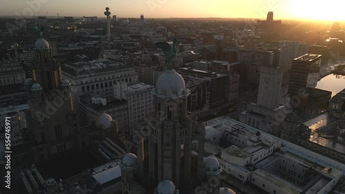Royal Liver Building in Liverpool, England by Drone at Sunrise