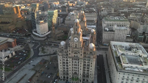 Royal Liver Building in Liverpool, England by Drone at Sunrise