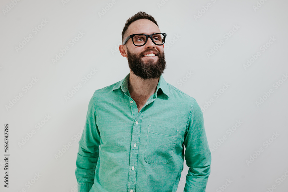 Obraz premium Young handsome caucasian male hipster isolated on white background. Eyeglass advertisement