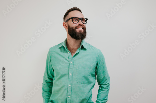 Young handsome caucasian male hipster isolated on white background. Eyeglass advertisement © San4ezz007