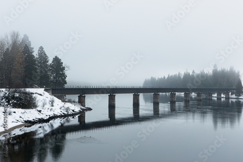 Railroad bridge on a foggy winter day. © Gregory Johnston