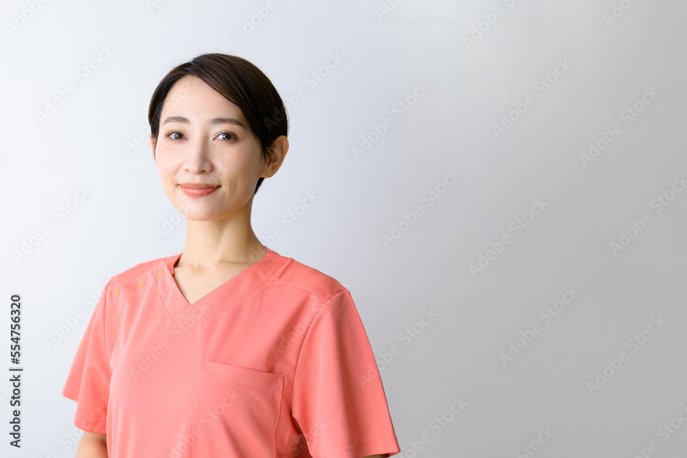 Image of a smiling, smiling, scruffy, user-friendly doctor (female doctor) Image of a smiling, smiling, scruffy, user-friendly doctor (female doctor)