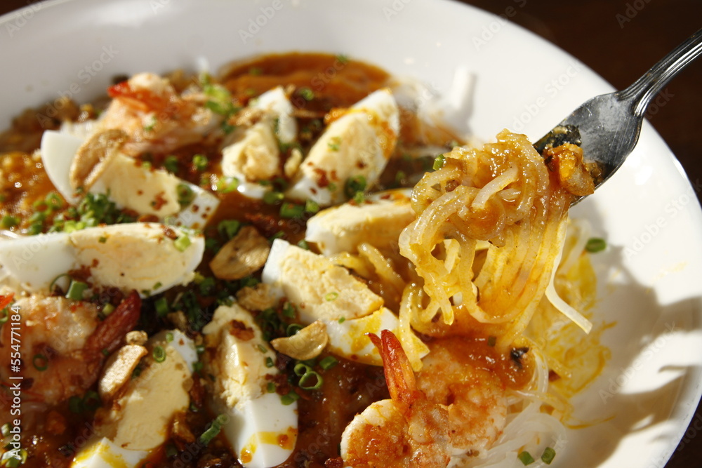 Pancit palabok, a noodle dish from the Philippines made from thin noodles called bihon, shrimp