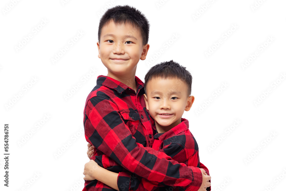 Happy brothers embracing and smiling, wearing red team shirt