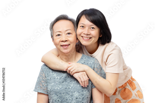 Happy daughter embracing senior mother, asian woman family caring and smiling together