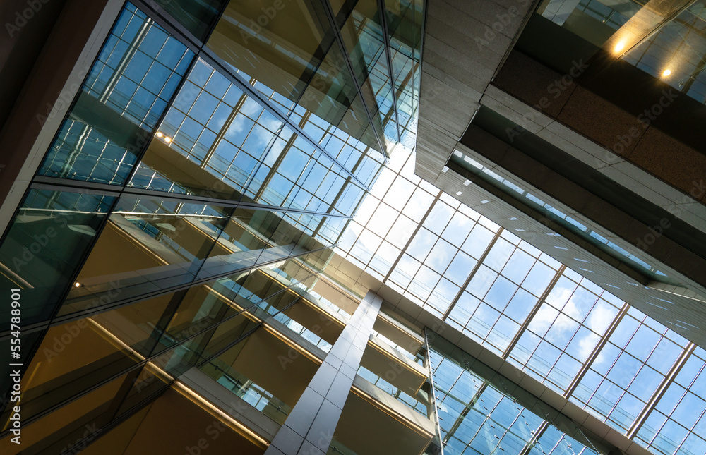 Modern building, indoor and low angle shot with sky view. Modern building, indoor and low angle shot with sky view.