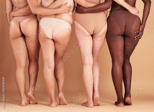 Women group, lingerie and butt in studio for wellness, fashion and diversity with plus size in unity. Back, bum and woman model team with solidarity, body positive or health for beauty by background