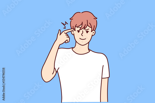 Man touches temple with finger wanting to show presence of idea or important thoughts. Young guy in t-shirt with smile makes gesture of gun by bringing hand to head. Flat vector image