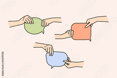 Diverse people hands holding speech bubbles for online communication or message. Men and women with talk balloons communicating. Vector illustration. 