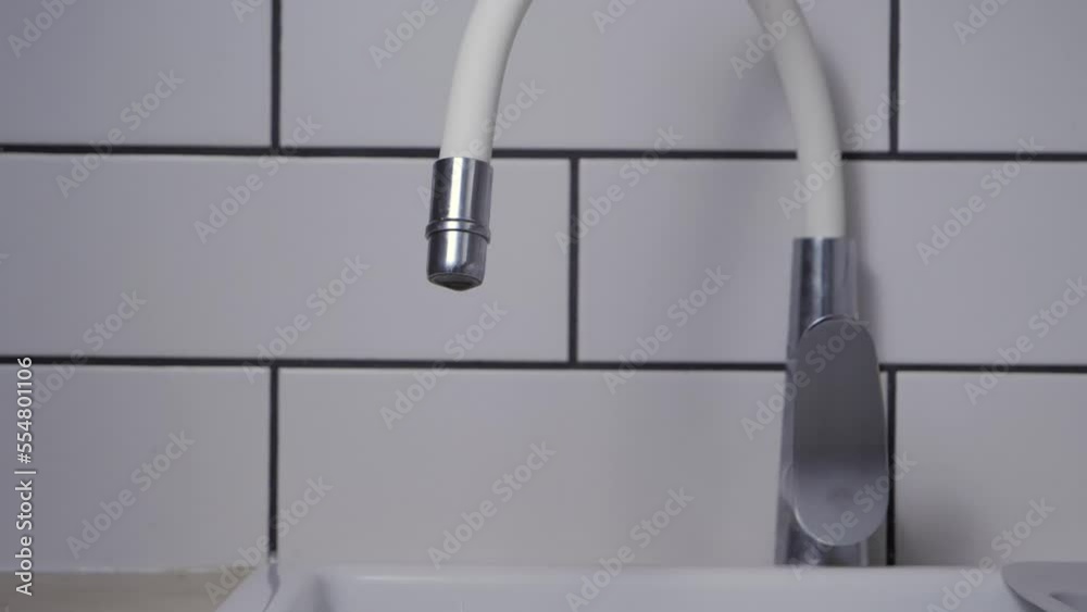 Water tap drip, static slow motion. Water tap drip, static slow motion.