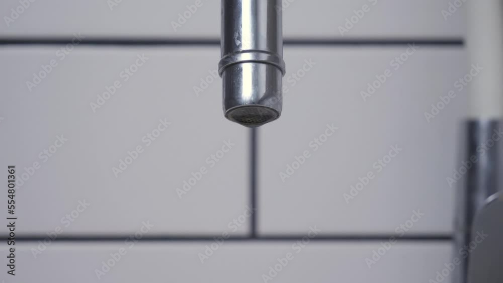 Water tap leak, static 4K close up. Water tap leak, static 4K close up.