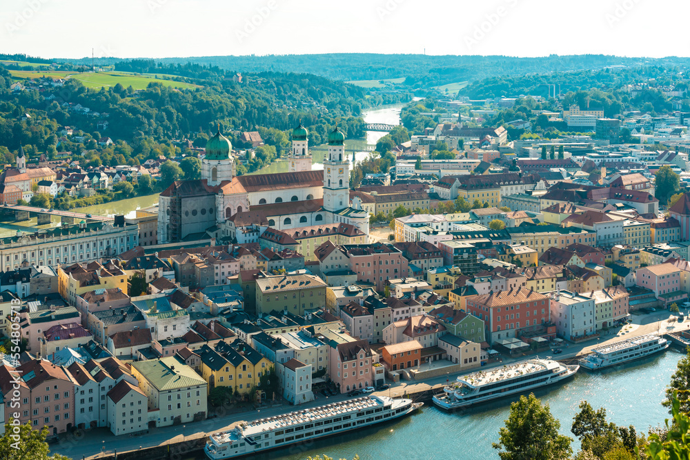 Germany, Bavaria, Passau, Old town houses with St. Stephens Cathedral in background Germany, Bavaria, Passau, Old town houses with St. Stephens Cathedral in background