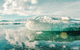 Glacier in mirror sea water landscape photo. Beautiful nature scenery photography with cloudy sky on background. Idyllic scene. High quality picture for wallpaper, travel blog, magazine, article