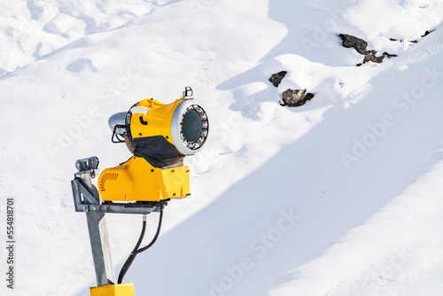 Snow guns in a winter mountain resort photo