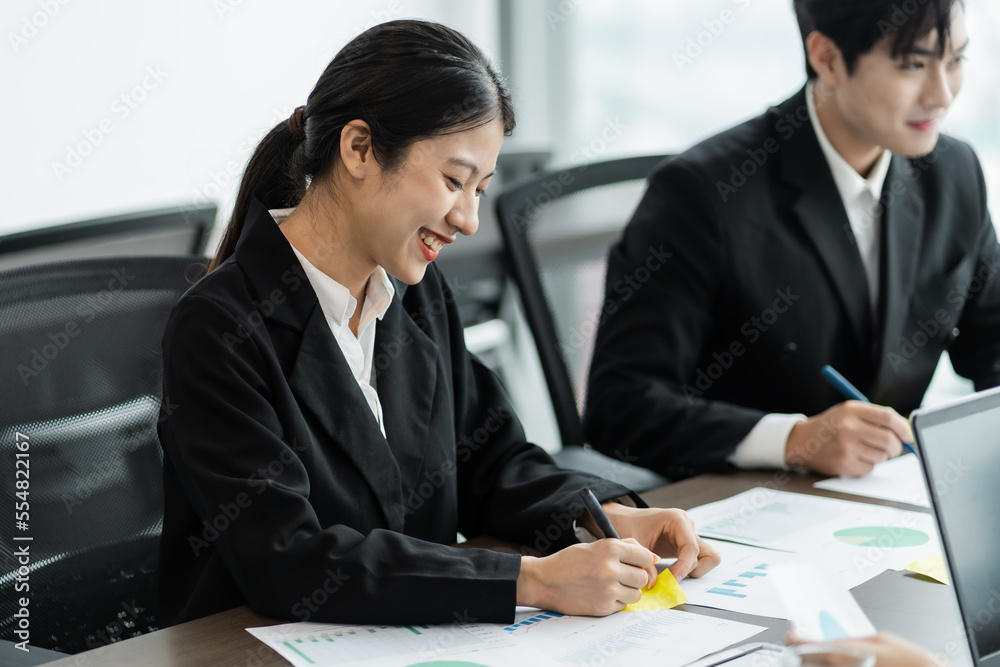 image of a group of Asian businessmen working together at the company image of a group of Asian businessmen working together at the company