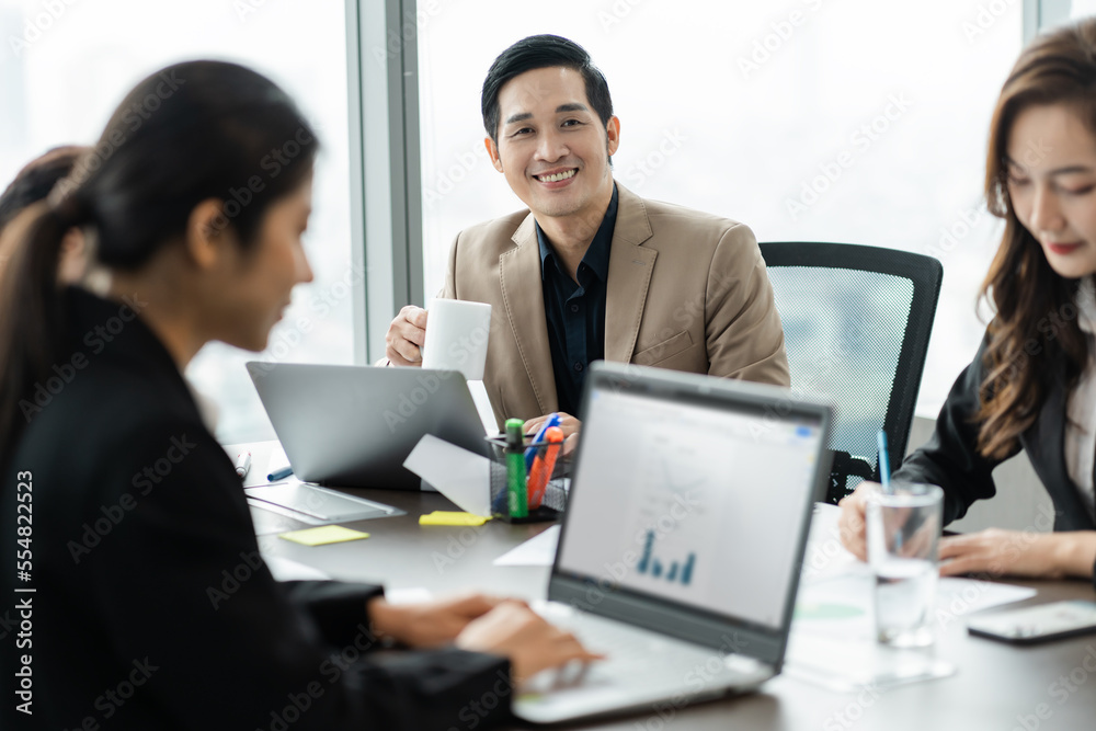 image of a group of Asian businessmen working together at the company image of a group of Asian businessmen working together at the company