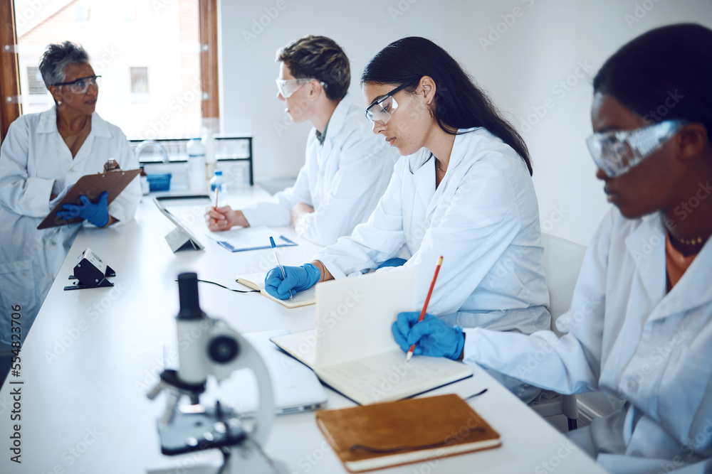 Science team, collaboration and medical students or expert research analysis for healthcare. Education, professor teaching and brainstorming for laboratory analytics or planning strategy innovation Science team, collaboration and medical students or expert research analysis for healthcare. Education, professor teaching and brainstorming for laboratory analytics or planning strategy innovation