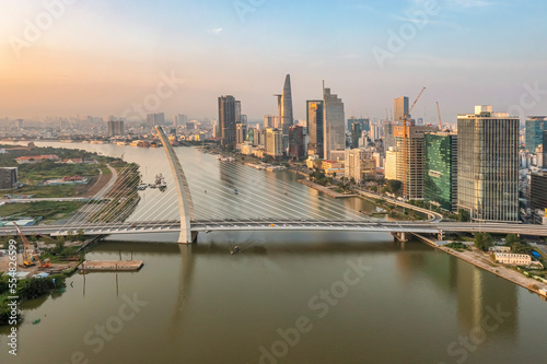 PANORAMA WITH SAI GON RIVER AND BA SON BRIDGE. VIEW FROM DISTRICT 1 TO THU THIEM, HO CHI MINH CITY, VIETNAM