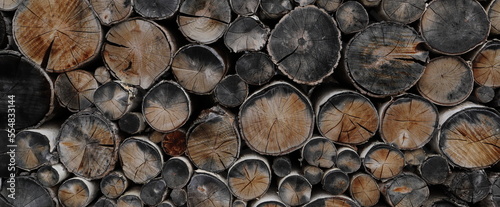 different round wooden disks as a background on a board  