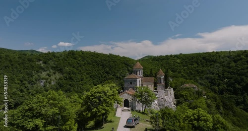 Exterior Of Motsameta Monastery Surrounded By Picturesque Green Canyons In Imereti, Near Kutaisi In Georgia. aerial ascend photo