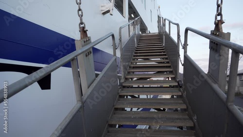 Spring, 2020 - Sakaiminato, Japan - Passenger ferry gangway. The camera moves along the metal ladder to the passenger deck.