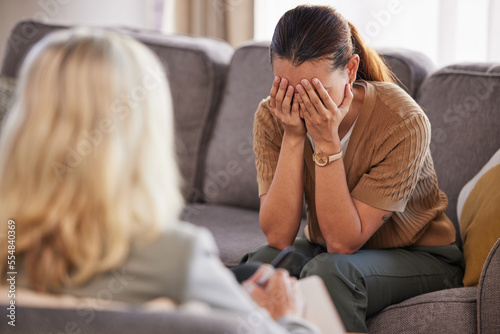 Psychology, mental health and depression with women, doctor with patient and stress, sad and frustrated in therapy session. Psychologist, depressed and cry with therapist counseling through trauma.