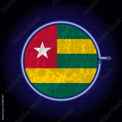 Togo neon grunge flag on wall backgrond. Vector illustration.
