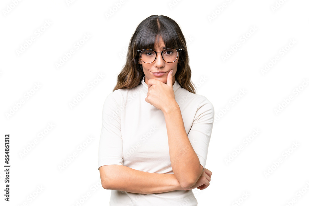 Young caucasian woman over isolated background thinking Young caucasian woman over isolated background thinking