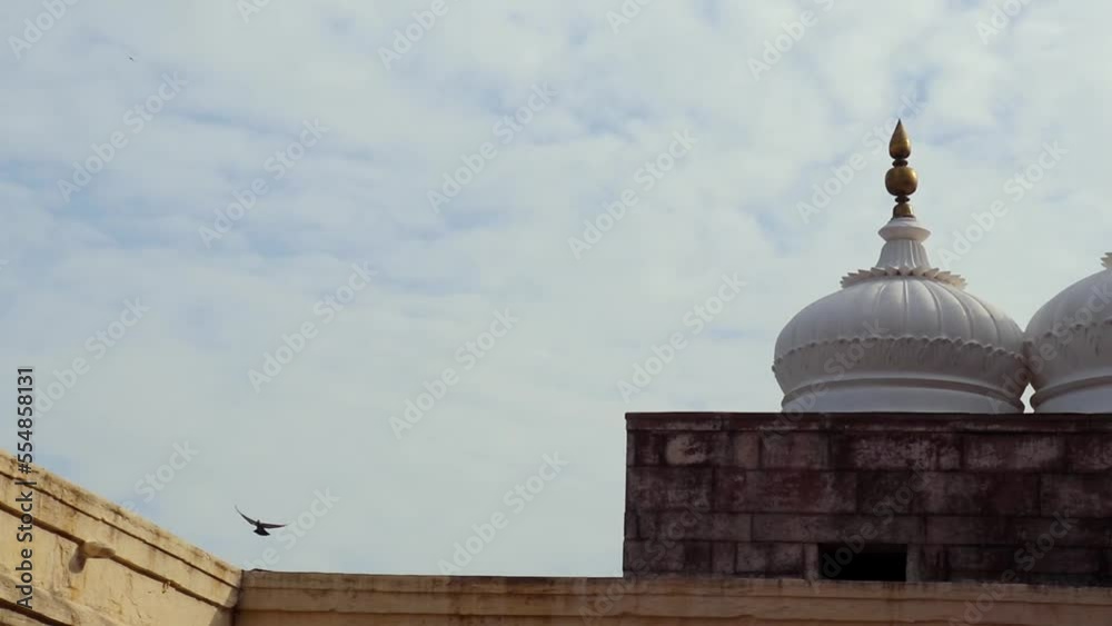 temple dome many with bright blue sky from flat angle temple dome many with bright blue sky from flat angle
