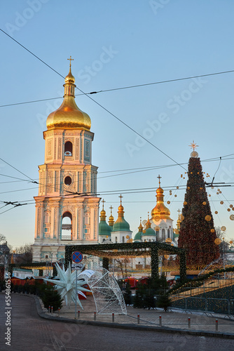 Festive Christmas tree with garlands of the year 2022 and St Sophia Cathedral in Kyiv