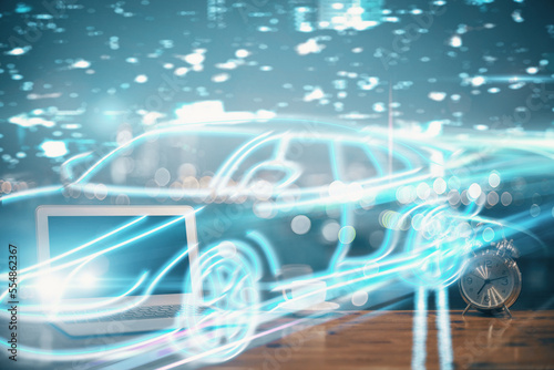 Desktop computer background in office with automobile hologram drawing. Multi exposure. Tech concept.