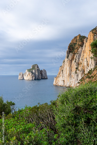 vertical landscape of the cliffs and sea stacks at Porto Flavia on Sardinia