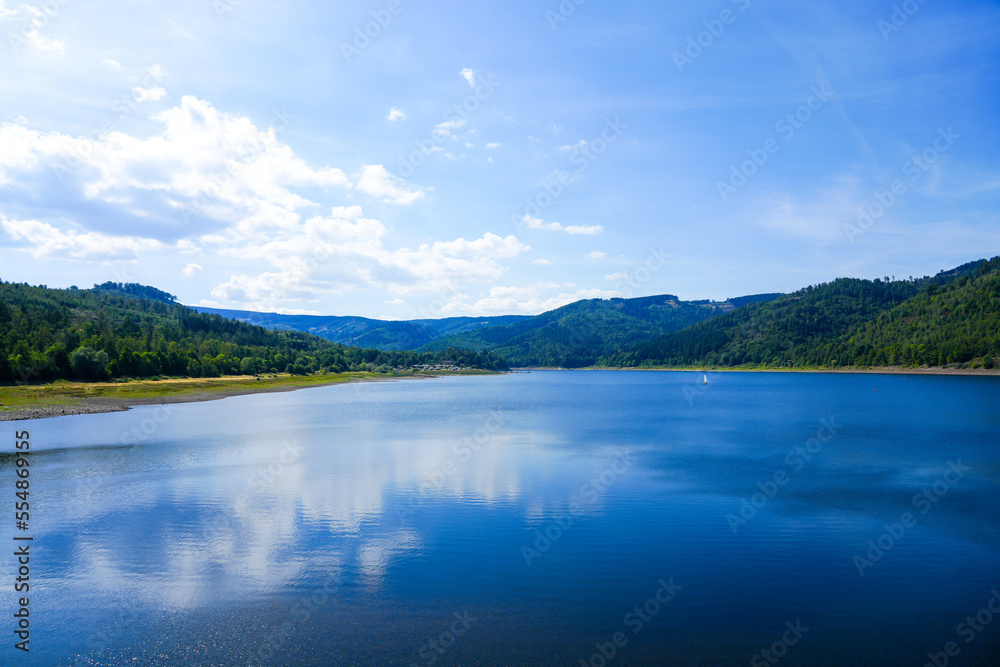 View of the Innerstetalsperre with the surrounding nature. Landscape at the Innerste reservoir. Lake in the Harz.
