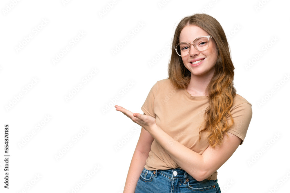 Young pretty woman over isolated background presenting an idea while looking smiling towards Young pretty woman over isolated background presenting an idea while looking smiling towards