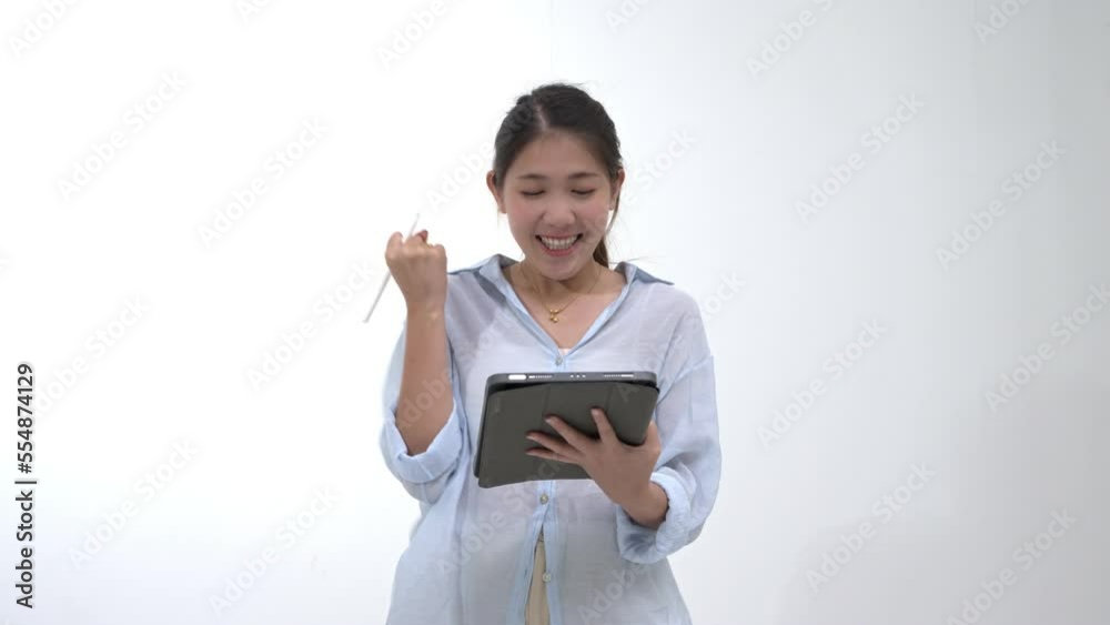 White shirt woman holding tablet and pen gesturing in the white background. White shirt woman holding tablet and pen gesturing in the white background.