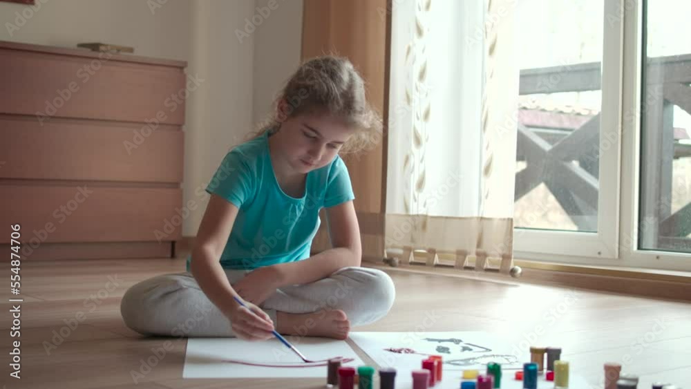 Portrait of Talented Artist Child Working on Abstract Painting Uses Paintbrush. Little Girl Painting Picture at Home. Children Creativity Inspiration Imagination. Cute Girl Kid Enjoys Painting Process Portrait of Talented Artist Child Working on Abstract Painting Uses Paintbrush. Little Girl Painting Picture at Home. Children Creativity Inspiration Imagination. Cute Girl Kid Enjoys Painting Process