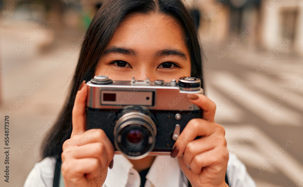 Asian female tourist student on city streets Asian female tourist student on city streets