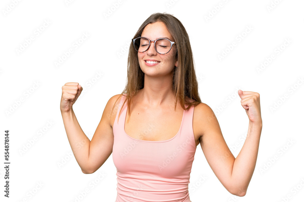 Young pretty woman over isolated background doing strong gesture Young pretty woman over isolated background doing strong gesture
