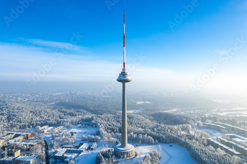 Aerial winter snowy day view of frozen Vilnius TV Tower, Lithuania