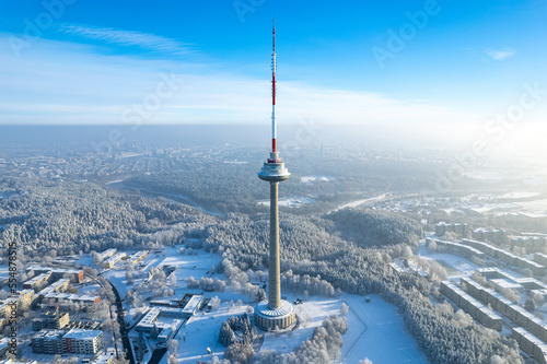 Aerial winter snowy day view of frozen Vilnius TV Tower, Lithuania