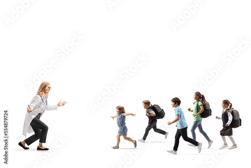 Group of children running towards a female doctor © Ljupco Smokovski
