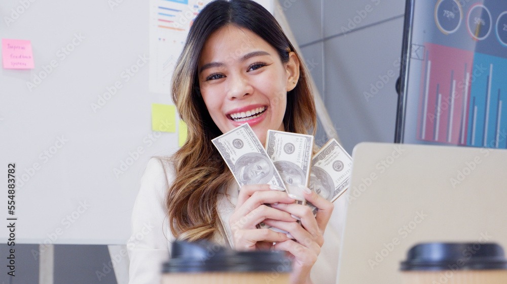 Smiling businessman holding dollar money. Business concept. Smiling businessman holding dollar money. Business concept.
